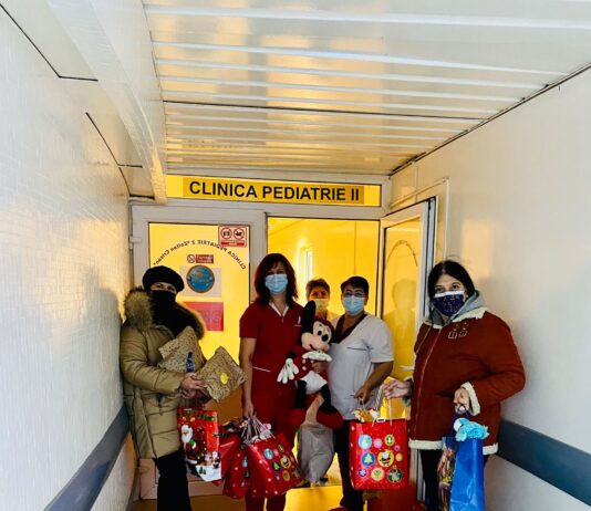 Campania “Facem fapte bune cu oameni buni”: În ziua Sfântului Nicolae, copiii internați în secția de Oncopediatrie a SCJU Craiova au primit daruri și au fost împărtășiți de către preotul Spitalului, Marcel Seliște